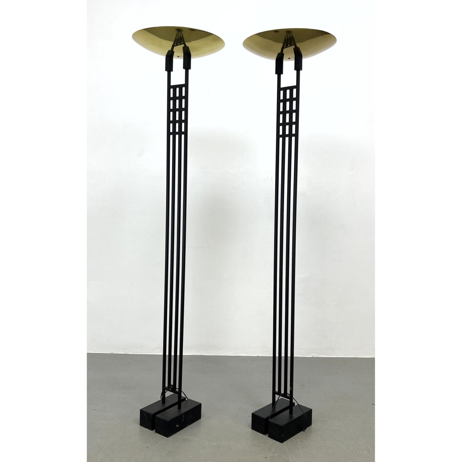 Appraisal: Pr Tall Modernist Memphis style Black and Brass Torchieres Floor