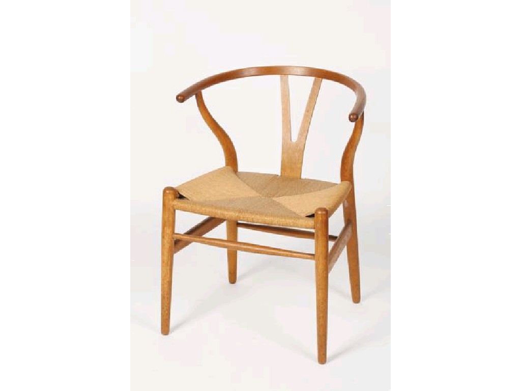 Appraisal: HANS WEGNER A WISHBONE CHAIR MODEL CH with shaped back