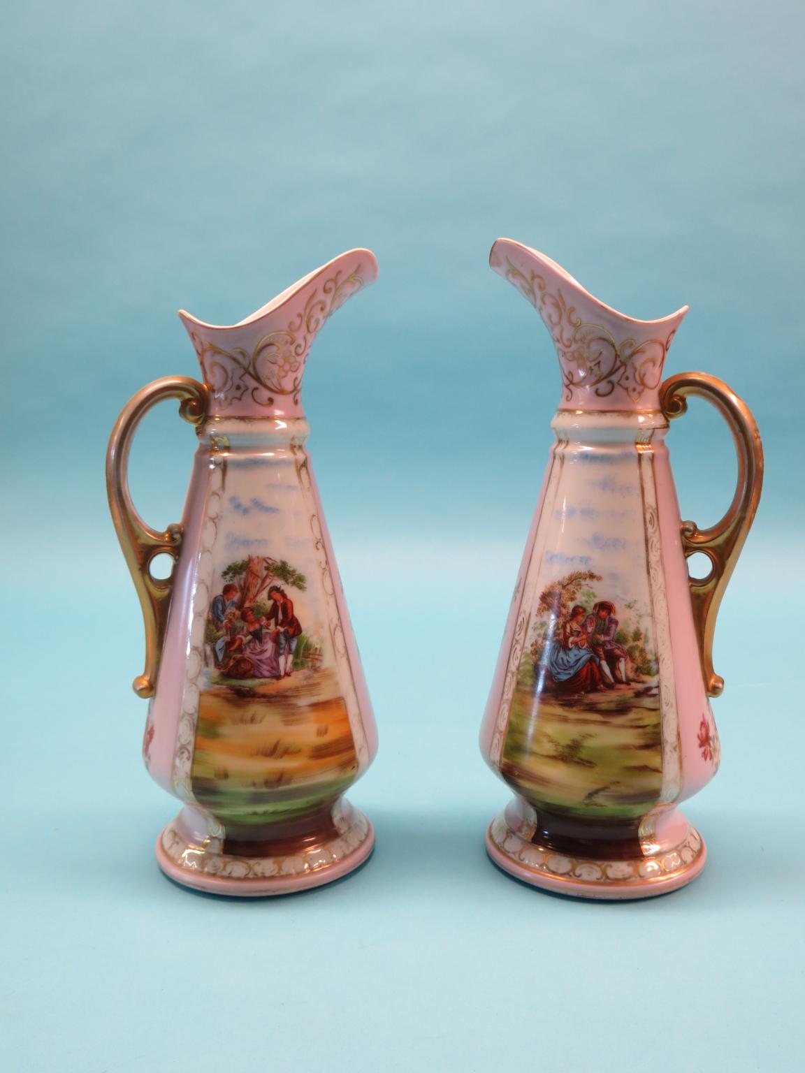 Appraisal: A pair of th century Dresden porcelain ewers colour-printed with