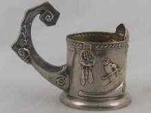 Appraisal: A heavy Russian silver tea glass holder in the Pan