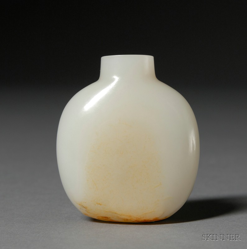 Appraisal: Jade Pebble China th century pure white stone with russet