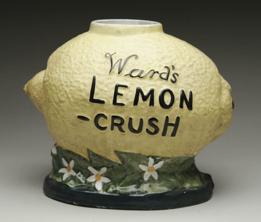 Appraisal: WARD S LEMON-CRUSH SYRUP DISPENSER Figural lemon ceramic dispenser with