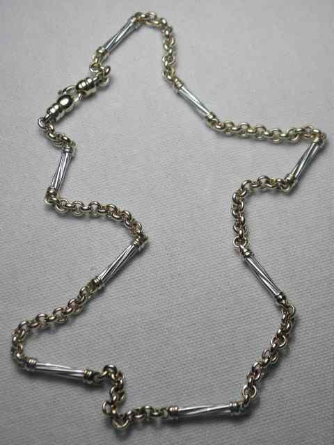 Appraisal: A k yellow and white gold pocket watch chain Clasp