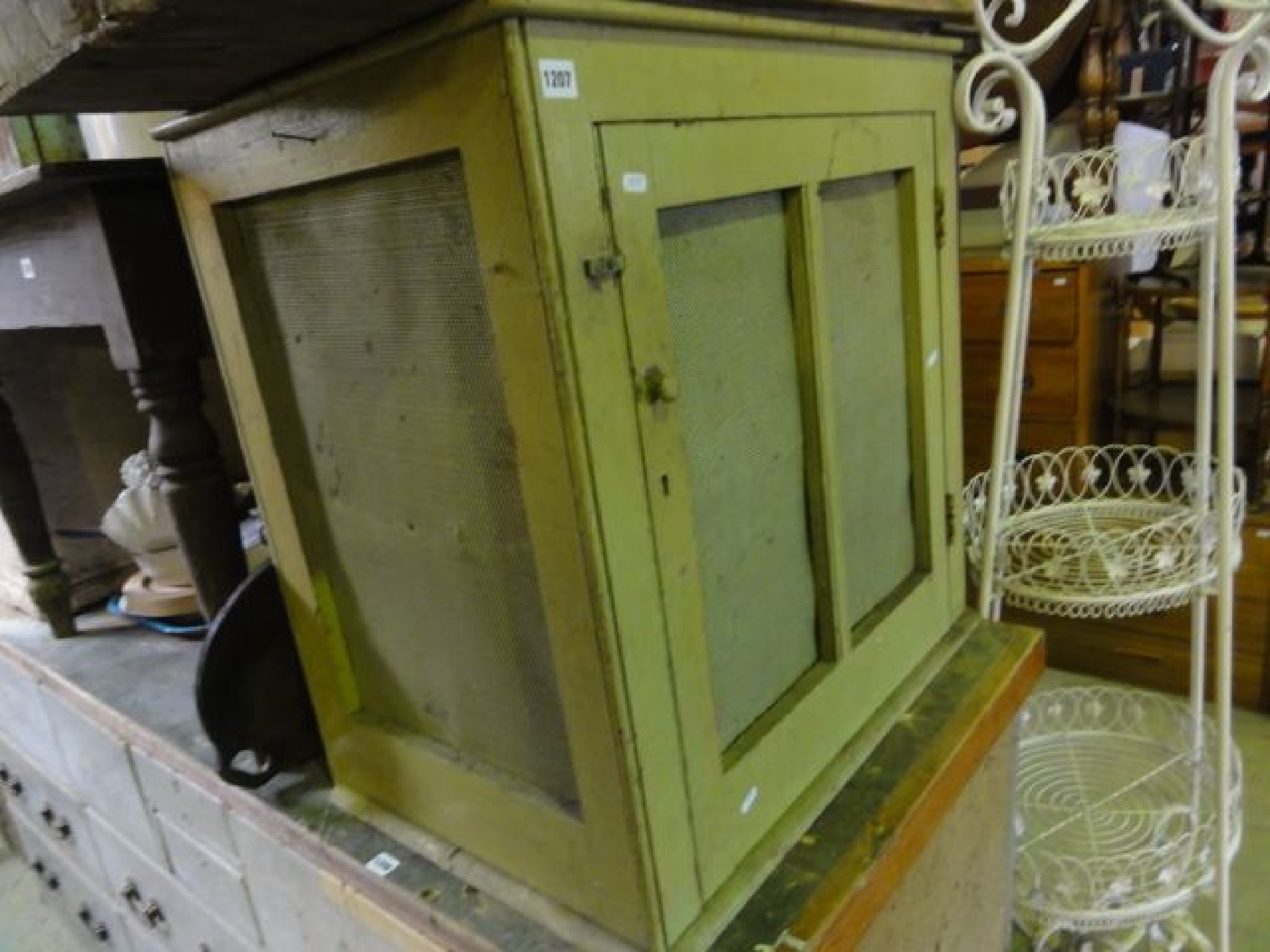 Appraisal: An old painted pine meat safe enclosed by a single