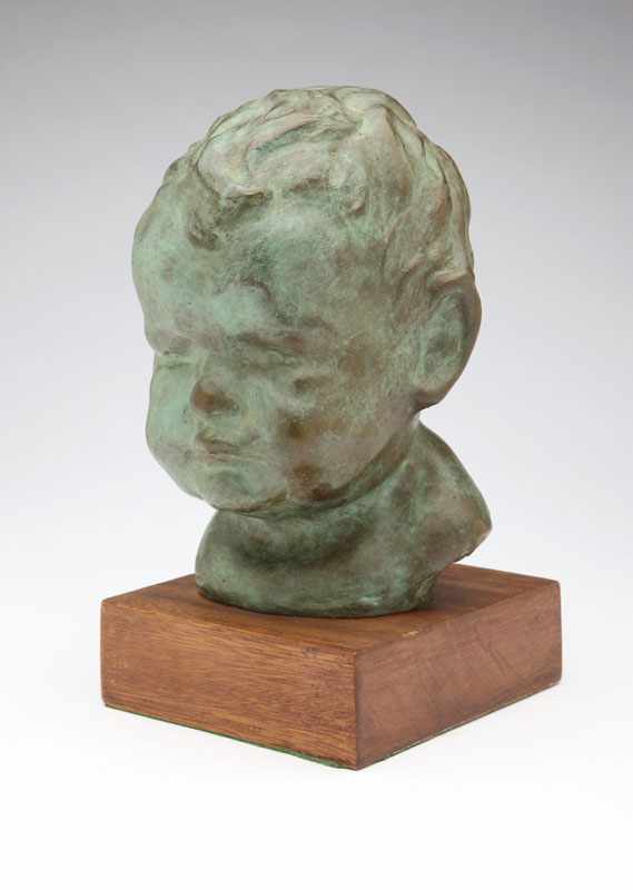 Appraisal: A patinated bronze bust depicting a baby incised with signature