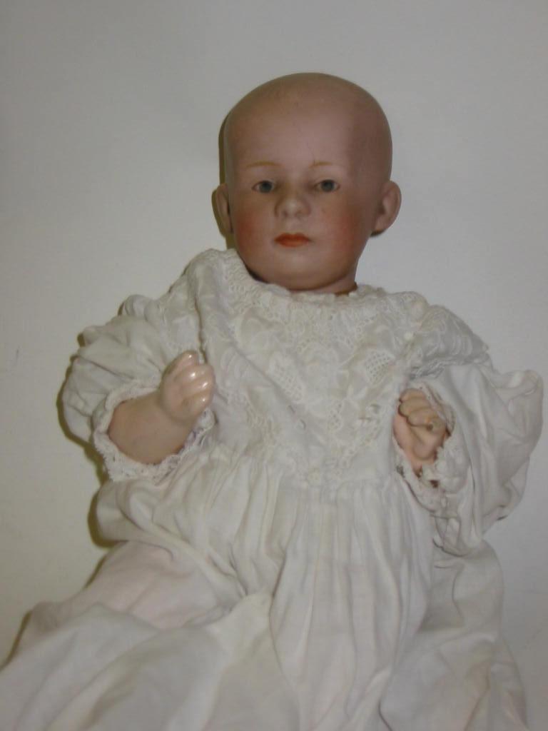 Appraisal: A Gebruder Heubach bisque head boy doll with painted face