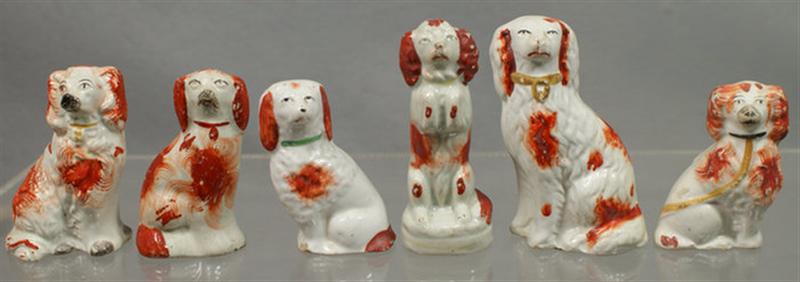 Appraisal: assorted small Staffordshire white and rust spaniels tallest generally good