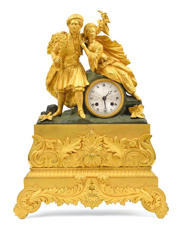 Appraisal: A FRENCH EMPIRE STYLE ORMOLU AND BRONZE FIGURAL MANTEL CLOCK