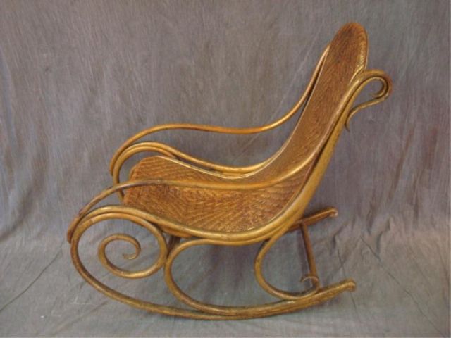 Appraisal: Thonet style bentwood caned giltwood rocker From a Manhattan NYC