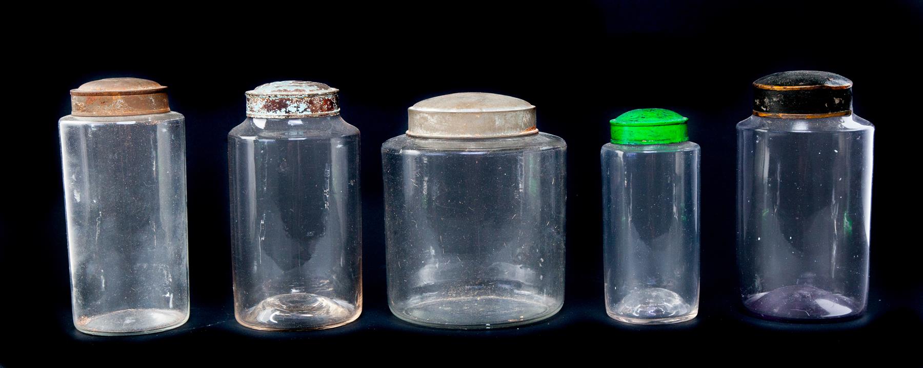 Appraisal: FIVE AMERICAN BLOWN GLASS CANISTERS Mid th century All with