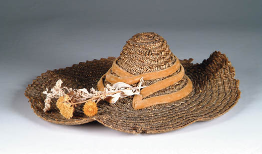 Appraisal: EARLY GRASS WOVEN HAT Flat reed like weave hat has