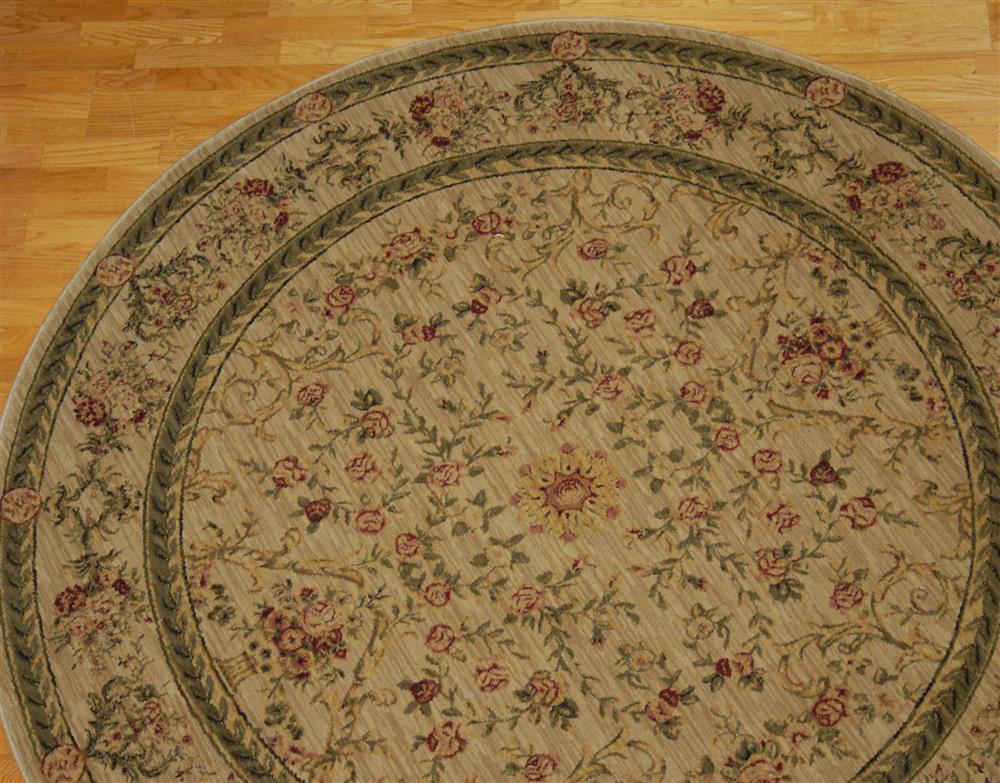 Appraisal: ROUND MACHINE-MADE ORIENTAL RUG having an allover traditional pattern woven