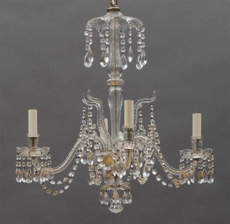 Appraisal: SMALL GEORGIAN STYLE CRYSTAL CHANDELIER With a double baluster-shaped stem