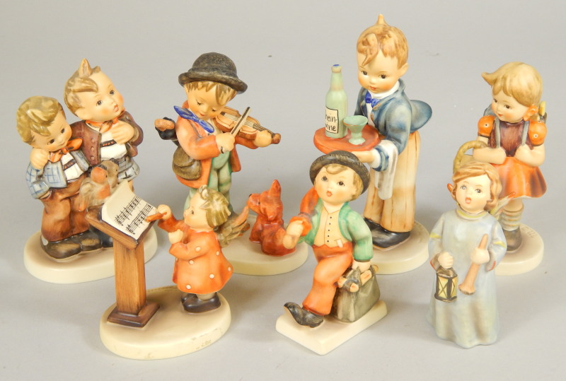 Appraisal: Seven Goebel ceramic figures after Hummel to include a violin