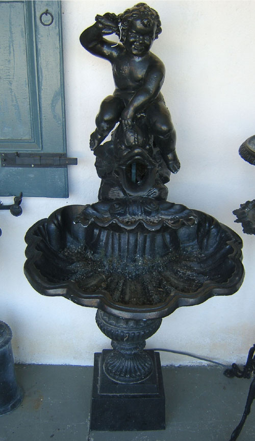 Appraisal: Cast iron fountain with a shell basin early th c