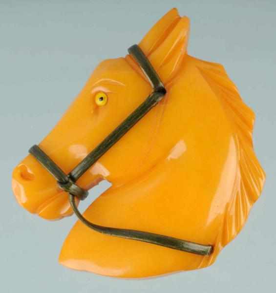 Appraisal: Bakelite Butterscotch Horse Head Pin Description CORRECTION Pin is a