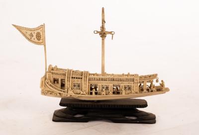 Appraisal: A th Century ivory barge celebrating a wedding cm long