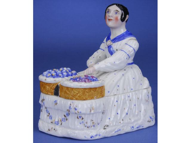 Appraisal: Early Peddler Lady Trinket Box Germany ca high quality glazed