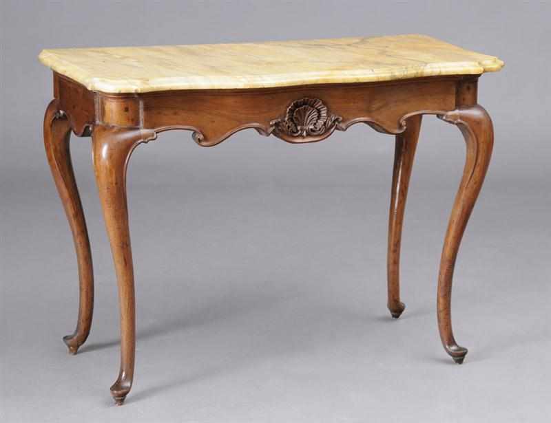 Appraisal: ITALIAN ROCOCO CARVED WALNUT CONSOLE TABLE The serpentine-fronted veined marble