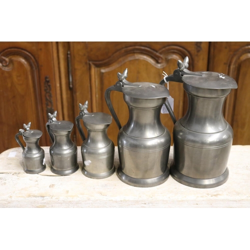 Appraisal: Set of graduating lidded pewter jugs approx cm H and