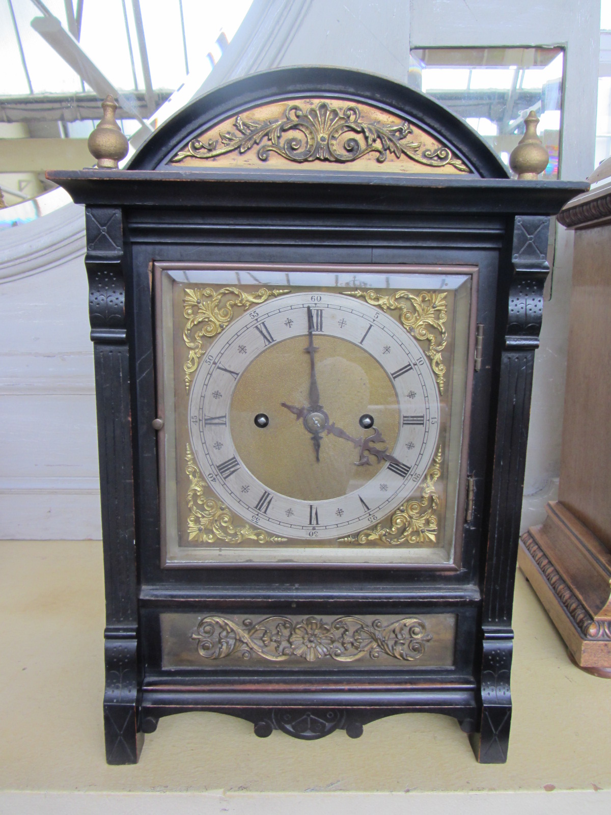 Appraisal: A German ebonised bracket clock late th century with architectural