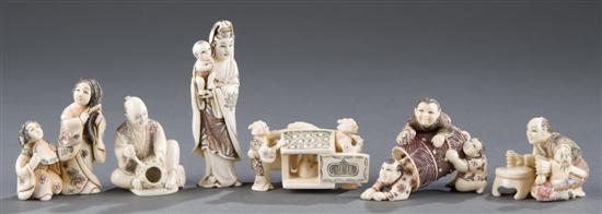 Appraisal: Group of carved ivory bone polychrome netsukes th century Kannon