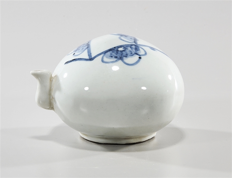 Appraisal: Korean blue and white porcelain water dropper with floral decoration