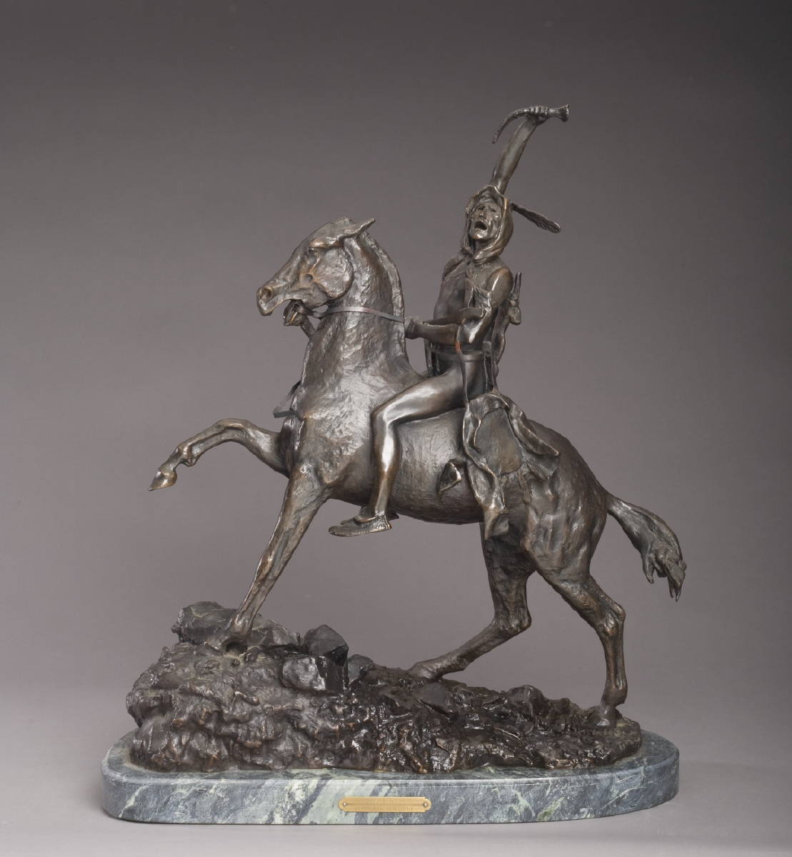 Appraisal: BRONZE FIGURE OF AN INDIAN ON HORSEBACK 'THE SCALP '