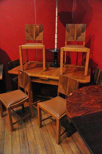 Appraisal: AN ART DECO OAK DINING SUITE OF SIX CHAIRS AND