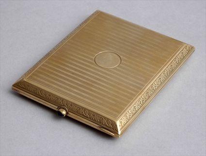 Appraisal: AUSTRIAN GOLD CIGARETTE CASE WITH SAPPHIRE THUMBPIECE The engine engraved