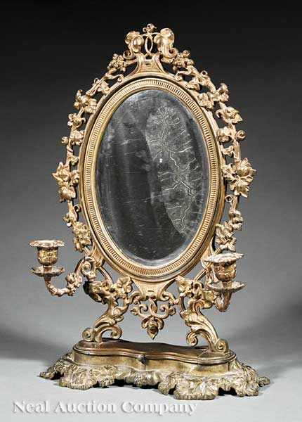 Appraisal: A Victorian Patinated Bronze Oval Shaving Mirror mid- th c