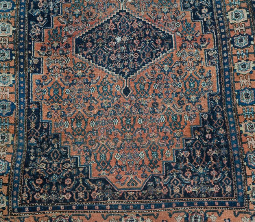 Appraisal: CENTRAL PERSIAN RUG c with terracotta lozenge within a dark