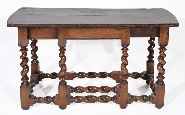 Appraisal: A CENTRE SECTION FROM A TH CENTURY OAK GATELEG TABLE