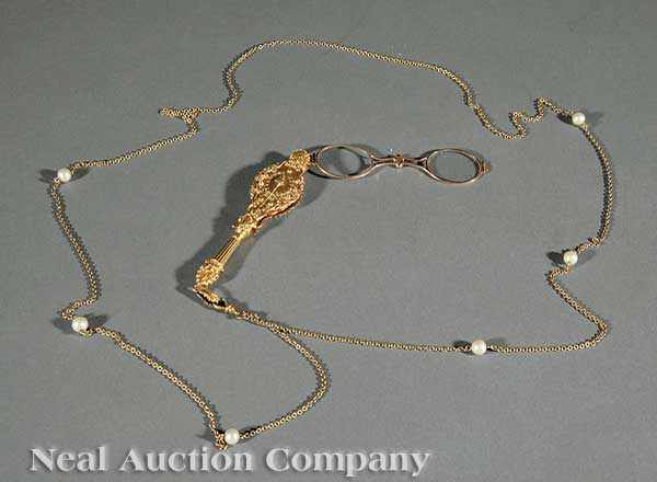 Appraisal: A Yellow Gold Lorgnette th c set with emeralds and