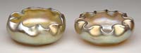 Appraisal: TWO TIFFANY STUDIOS OPEN SALTS Iridescent gold finish with ruffled