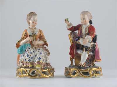 Appraisal: A pair of Derby models of a young man and