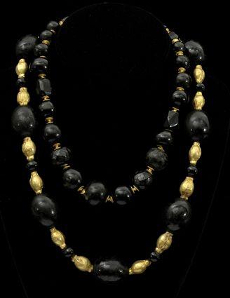 Appraisal: Two Gold Wash and Black Stone Bead Necklaces