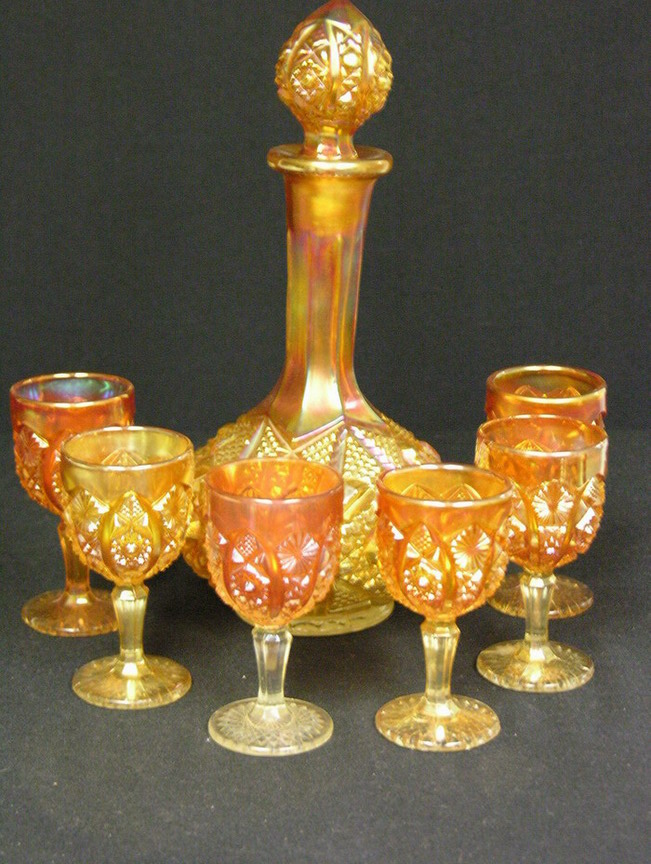 Appraisal: PC CARNIVAL GLASS DECANTER SET MARIGOLD Decanter Size