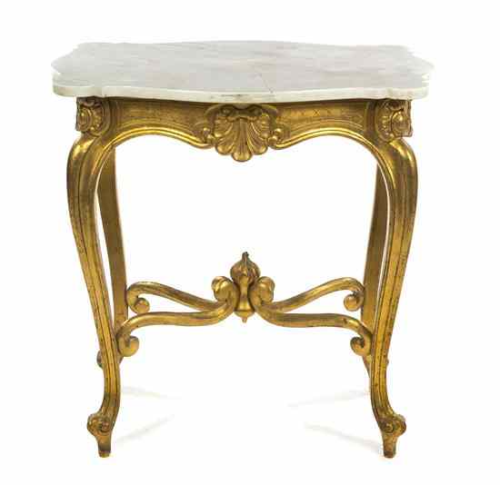 Appraisal: A Louis XV Style Giltwood Occasional Table having a shaped