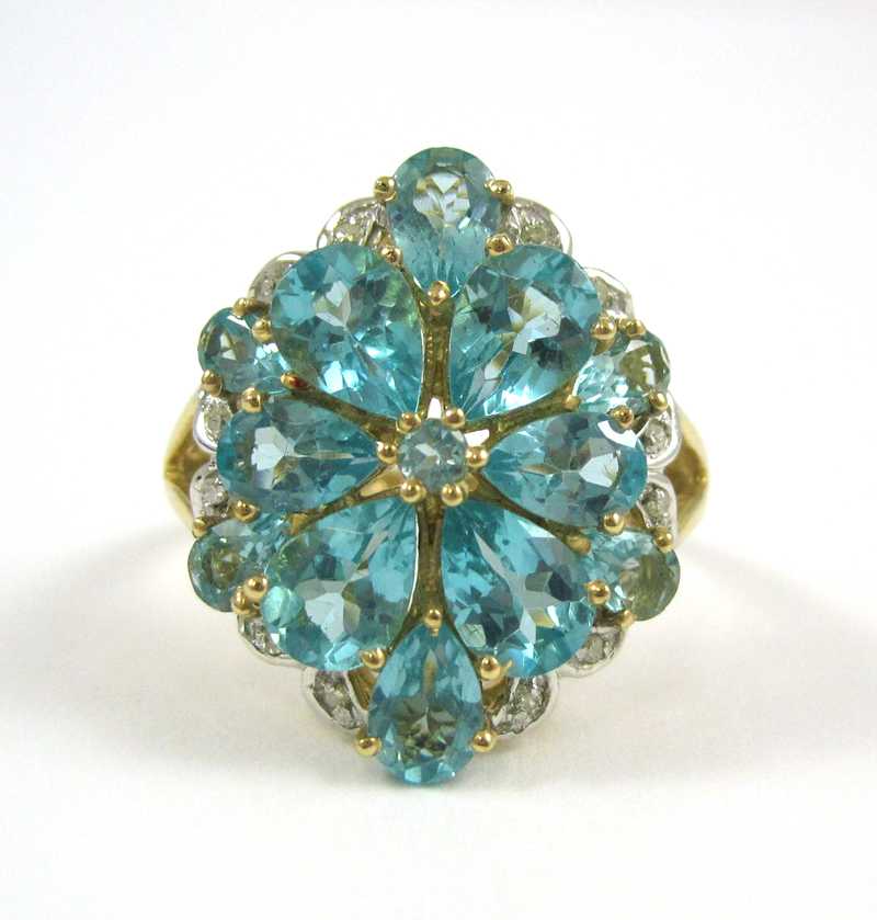 Appraisal: FOURTEEN KARAT GOLD APATITE AND DIAMOND RING single round-cut apatite