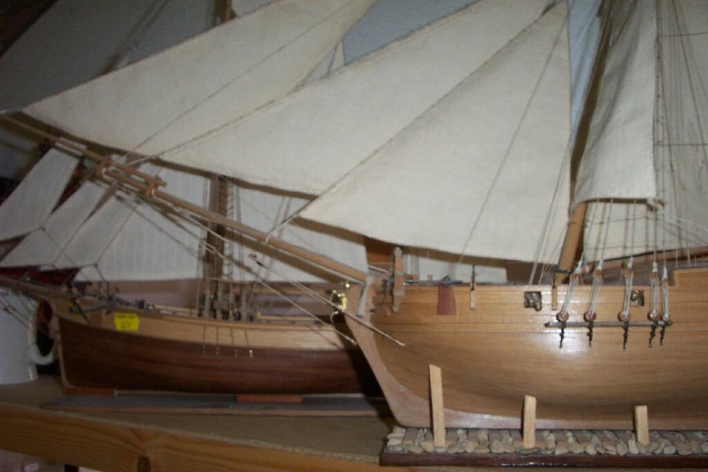 Appraisal: Two wooden scale models of sailing boats one example fitted