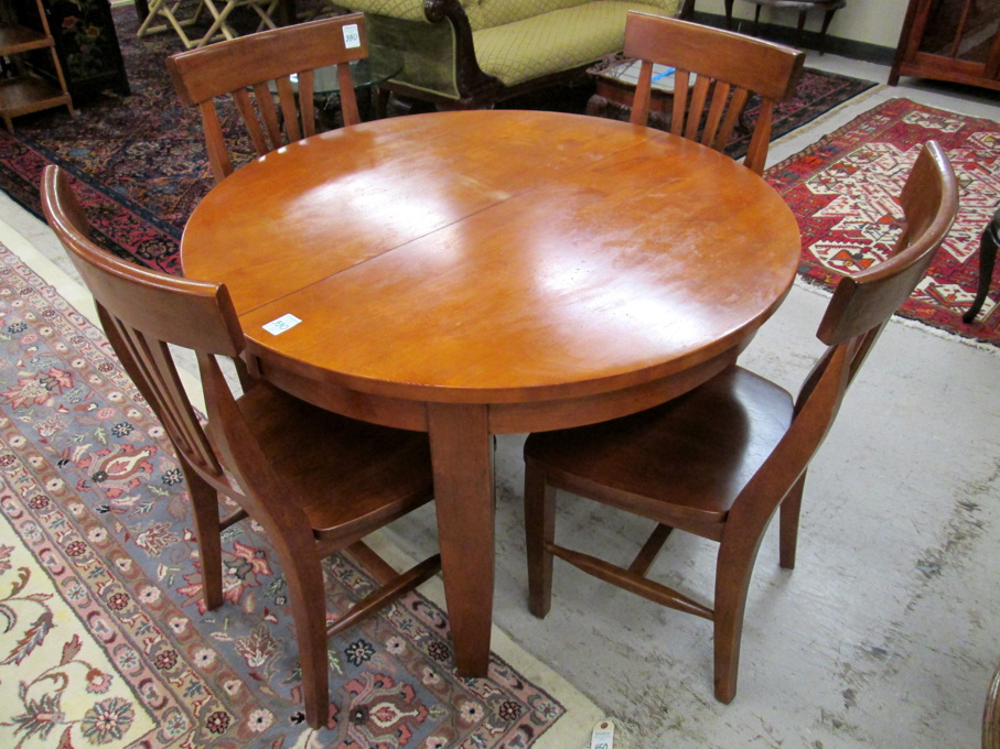 Appraisal: ROUND MAHOGANY DINING TABLE FOUR CHAIRS AND TWO LEAVES made