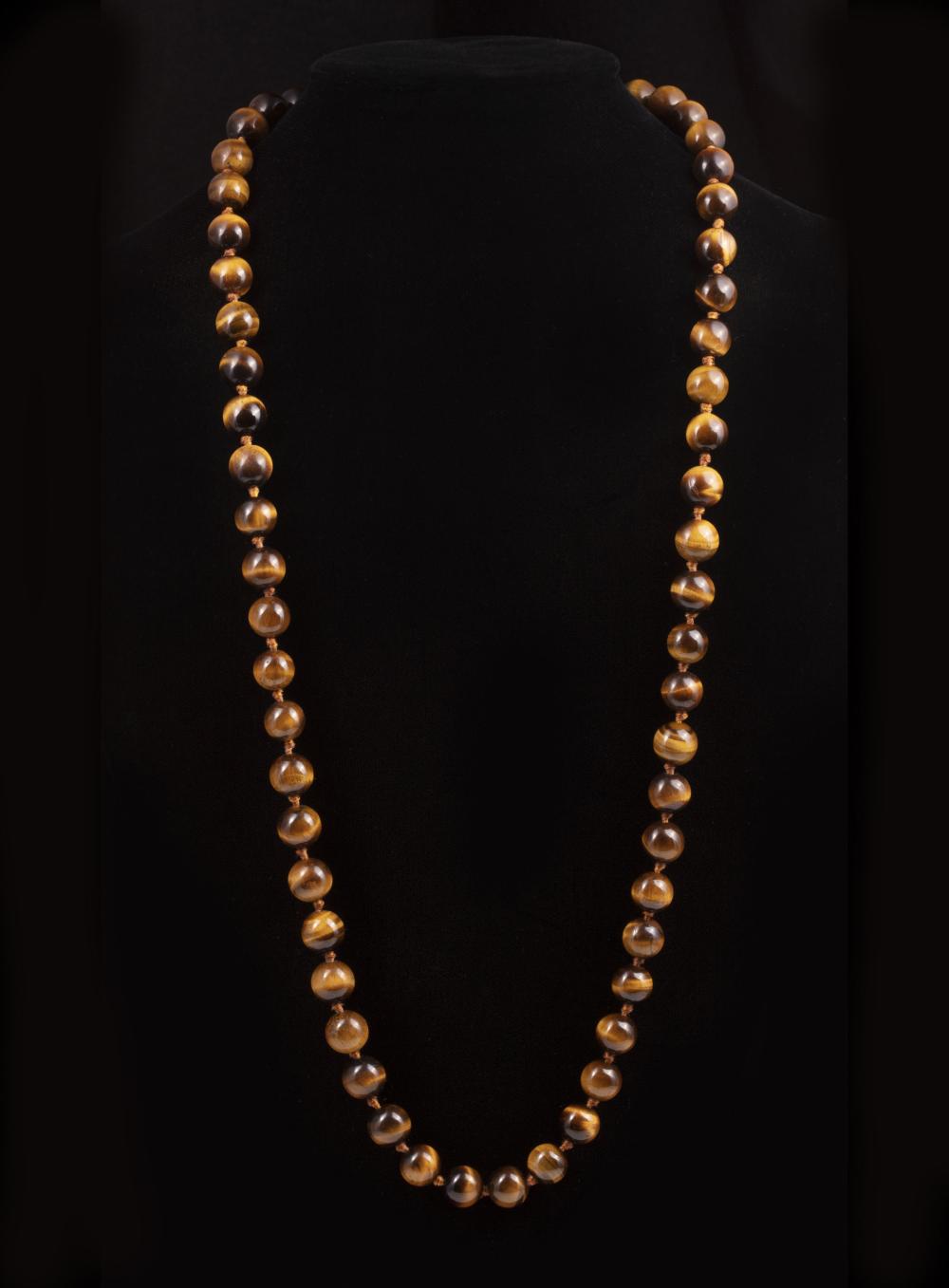 Appraisal: Necklace of Sixty mm Tiger's Eye Beads l in Please