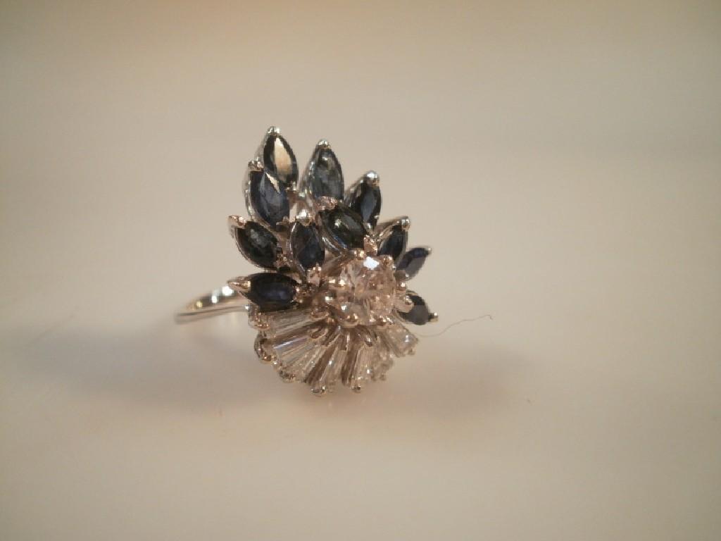 Appraisal: A diamond and sapphire leaf shaped cluster dress ring central