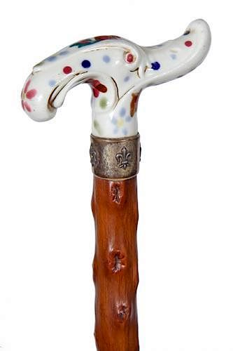 Appraisal: Porcelain Dress Cane Ca - An art nouveau porcelain handle