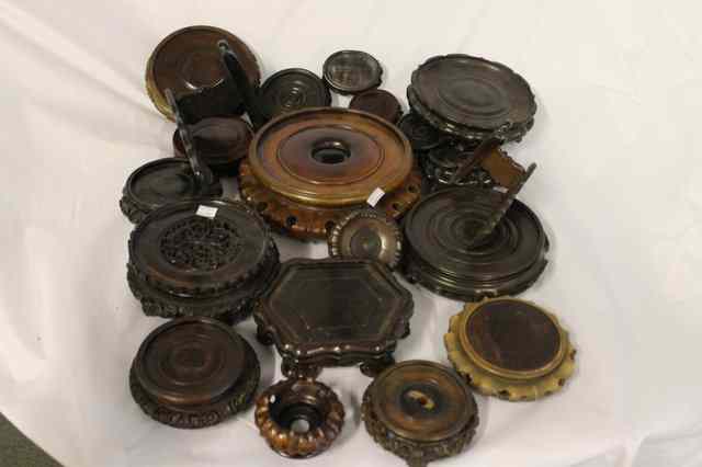 Appraisal: A BOX OF CHINESE HARDWOOD PLATE AND BOWL STANDS mainly