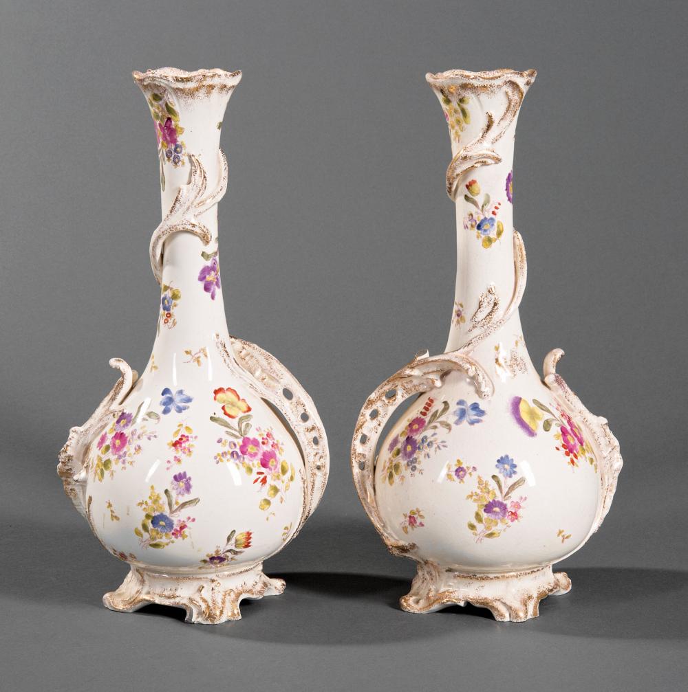 Appraisal: Pair of Dutch Polychrome and Gilt Porcelain Footed Bottle Vases