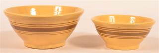 Appraisal: Yellowware Mixing Bowls with Brown Bands Two Yellowware Mixing Bowls