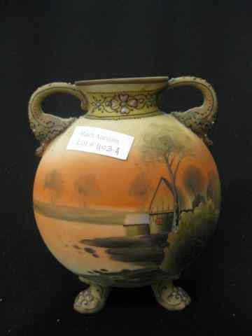 Appraisal: Nippon Handpainted Porcelain Vase satin sunset farm scene footed handled