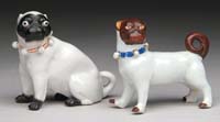 Appraisal: TWO SMALL GERMAN PORCELAIN BULLDOGS One seated with black face